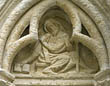 Panel 22:06 - Old man in hooded cloak, with staff and showing open book